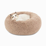 Beige calming pet bed for cats and dogs